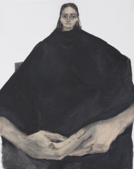 A painting by Audrey Levinthal of a woman ina dark, oversized garment. She is seated against a plain background, hands folded, exuding a contemplative, somber mood. The scale is distorted so that her hands loom largely in the foreground. Anomie Publishing